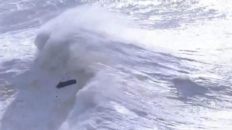 Facing Death: Big Wave Surfer Battling Monster Waves at Nazare