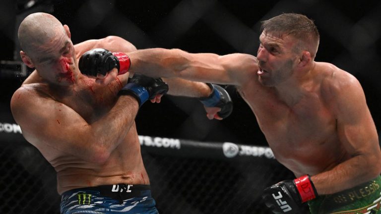 Mid-Fight Sledge Uncovered After UFC Champ Breaks Rival's Nose Twice