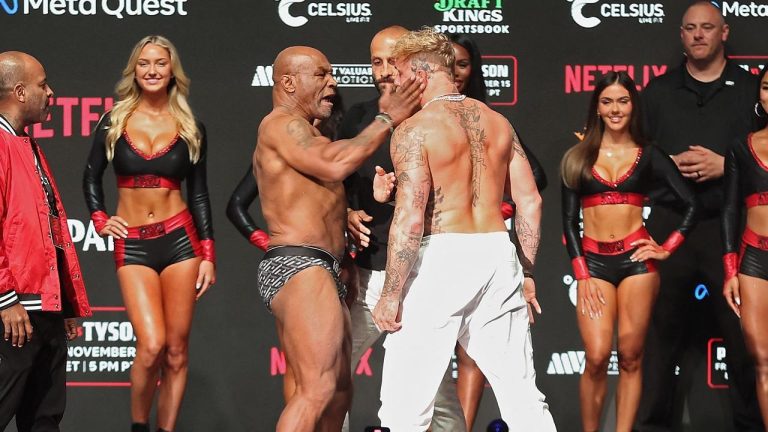 Mike Tyson Strikes Jake Paul in Intense Weigh-In Showdown