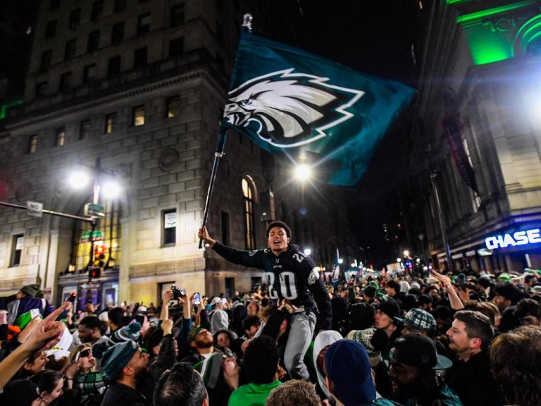 Philadelphia's Wild Celebration: Champagne, Fireworks, and Climbing Poles